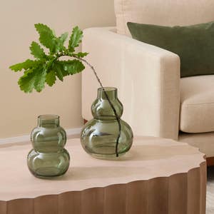 https://s3-ap-southeast-2.amazonaws.com/fusionfactory.commerceconnect.bbnt.production/pim_media/000/174/872/E-Comm_S24-25_Summer_LS_Studio-Decorator_Glass_Vases_Camden_Sage_SI.jpg?1730253566