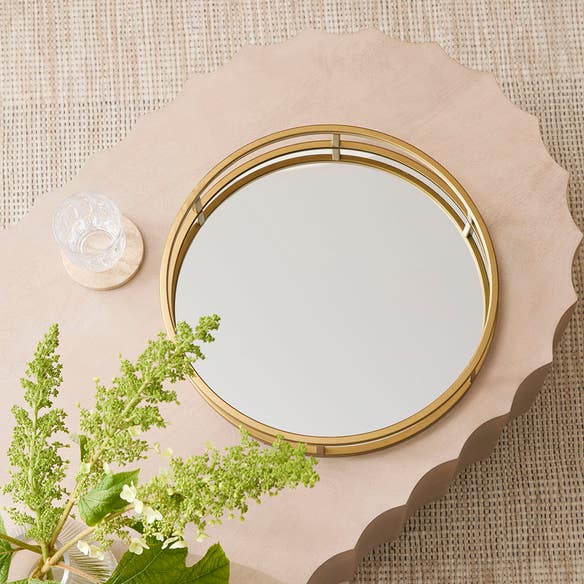 https://s3-ap-southeast-2.amazonaws.com/fusionfactory.commerceconnect.bbnt.production/pim_media/000/174/838/E-Comm_S24-25_Summer_LS_Studio_Trays_Boxes_Coasters_Round_Tray_With_Mirror_Gold_SI.jpg?1730251050