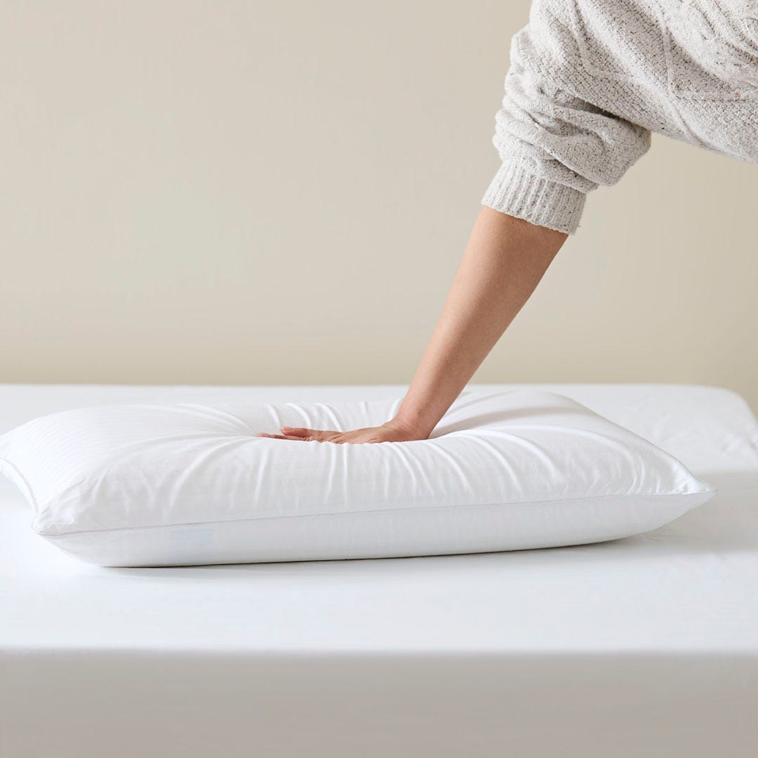 https://s3-ap-southeast-2.amazonaws.com/fusionfactory.commerceconnect.bbnt.production/pim_media/000/170/734/M_F_S24-25_Cat-Stacks_Pillow_Firmness_Test_Memory_Foam_Medium_SI.jpg?1727159647