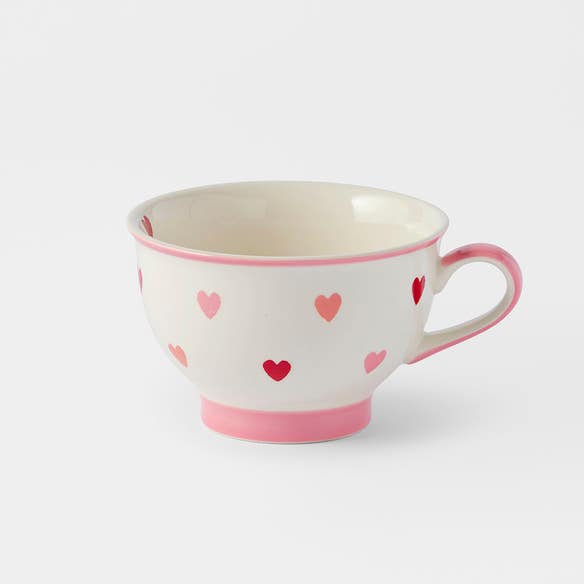 https://s3-ap-southeast-2.amazonaws.com/fusionfactory.commerceconnect.bbnt.production/pim_media/000/198/119/M_F_S25-26_Hearts-Pedestal-Tea-Cup_Pink_26520001_SI.jpg?1753164477