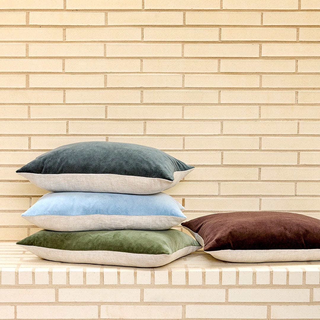 https://s3-ap-southeast-2.amazonaws.com/fusionfactory.commerceconnect.bbnt.production/pim_media/000/173/880/M_F_Summer_S24-25_LS_Location_Cushions_Range_Meera_Olive_Steel_Chambray_Cacao.jpg?1729725160