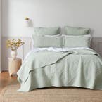 https://s3-ap-southeast-2.amazonaws.com/fusionfactory.commerceconnect.bbnt.production/pim_media/000/157/029/M_F_W24_Bedspread_Asher-Coverlet_BOP_Sage-Green_SI.jpg?1702270500