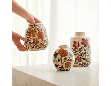 https://s3-ap-southeast-2.amazonaws.com/fusionfactory.commerceconnect.bbnt.production/pim_media/000/163/056/M_F_W24_LS_Decorator_Evergreen_Dana_Ceramic_Vase_2_SI.jpg?1713747928