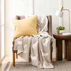 https://s3-ap-southeast-2.amazonaws.com/fusionfactory.commerceconnect.bbnt.production/pim_media/000/192/001/M_F_W25_LS_Decorator_Cushions_Throws_Mittens_Sherpa_Knit_Hero_SI.jpg?1743113518